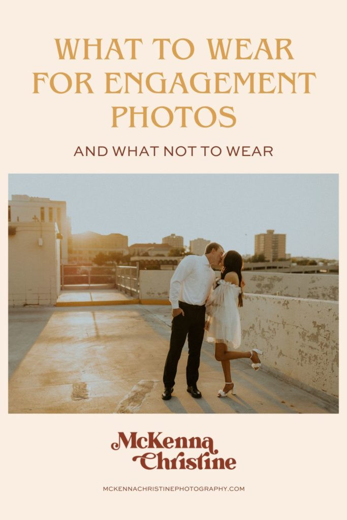 Engagement photo of a couple kissing on a rooftop with text overlay: What to Wear for Engagement Photos and What Not to Wear. Ideal for Pinterest sharing.