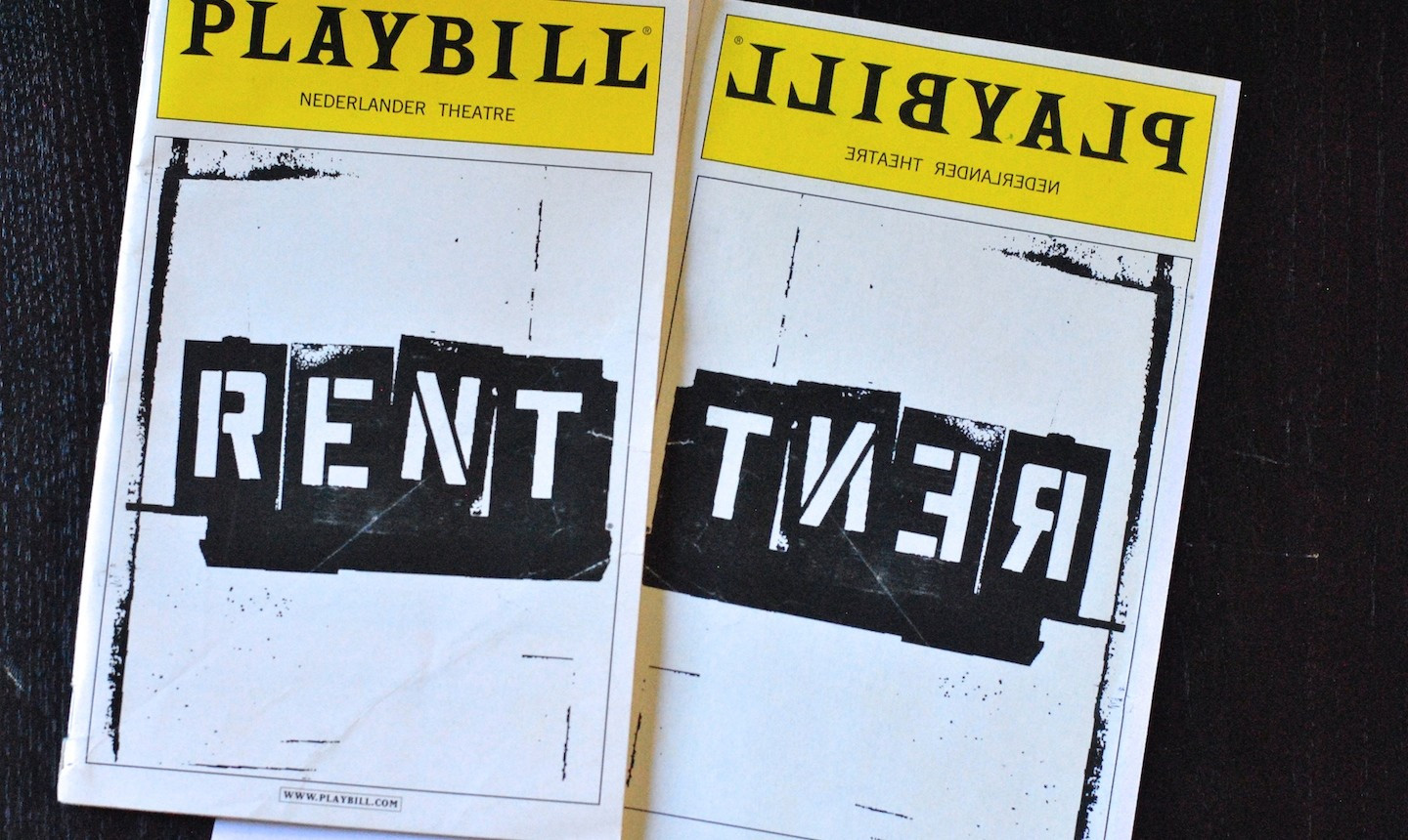 alt text: A playbill being photocopied.