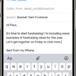 A screenshot of the iPhone Mail app with attachment options displayed above the keyboard.