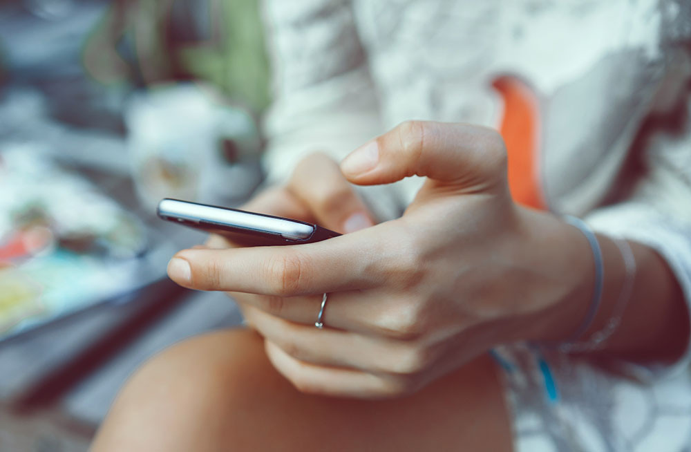 Woman holding a phone