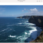 Screenshot of the Photos app interface on macOS, pointing to the 'Edit' button to enter photo editing mode.