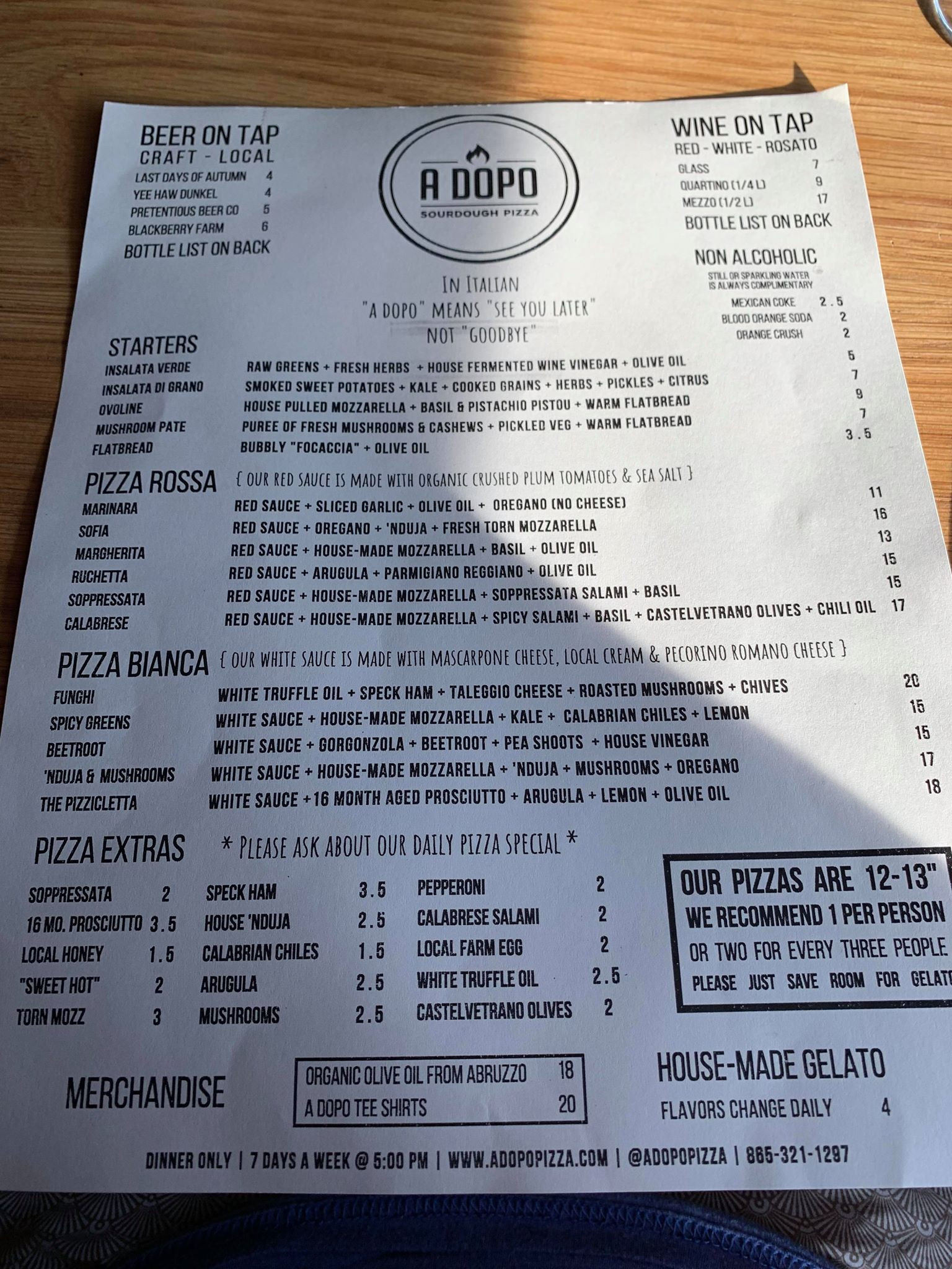 A Dopo Sourdough Pizza menu showcasing pizza selections and prices