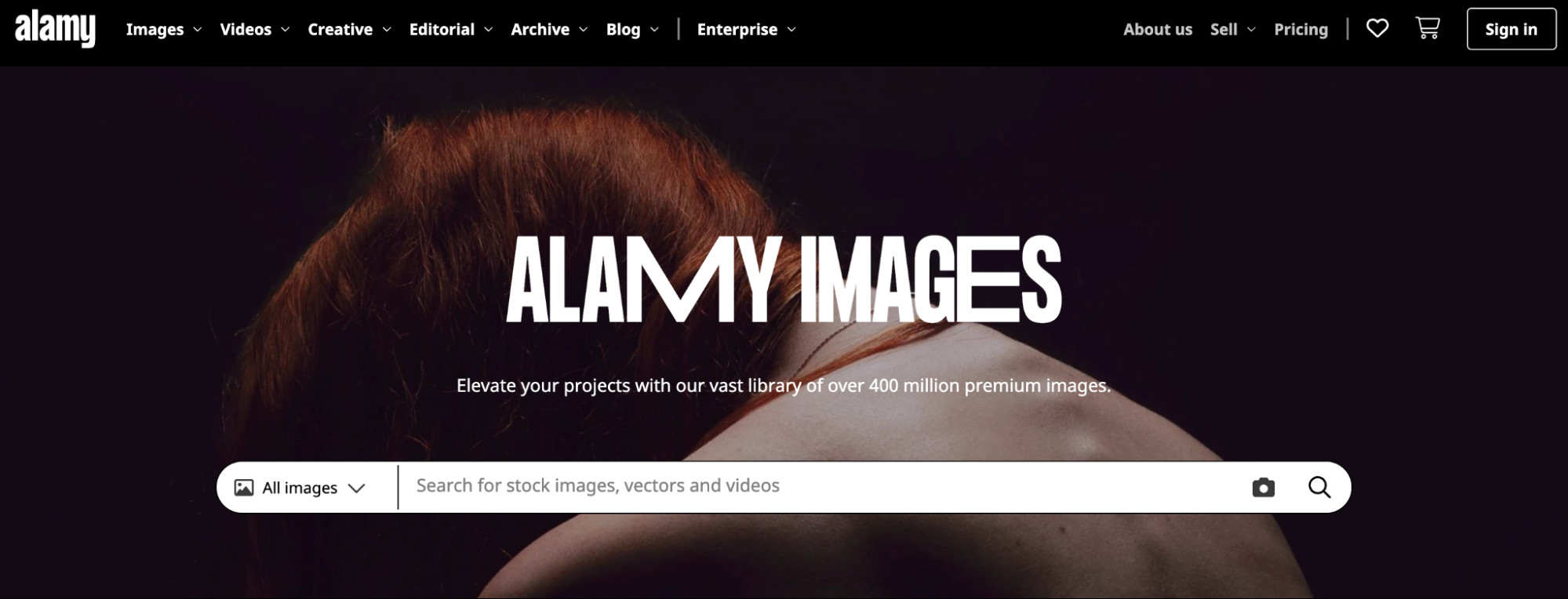 Alamy Images homepage showcasing a search bar for users to discover royalty-free images.