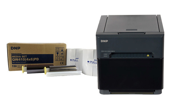 DNP DP-QW410 dye-sublimation printer producing vibrant, smudge-proof wedding photo booth prints