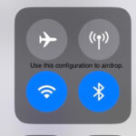 Turn off cellular data on iPhone to fix Airdrop issues in iOS 17. Control Center view showing cellular data toggle off.