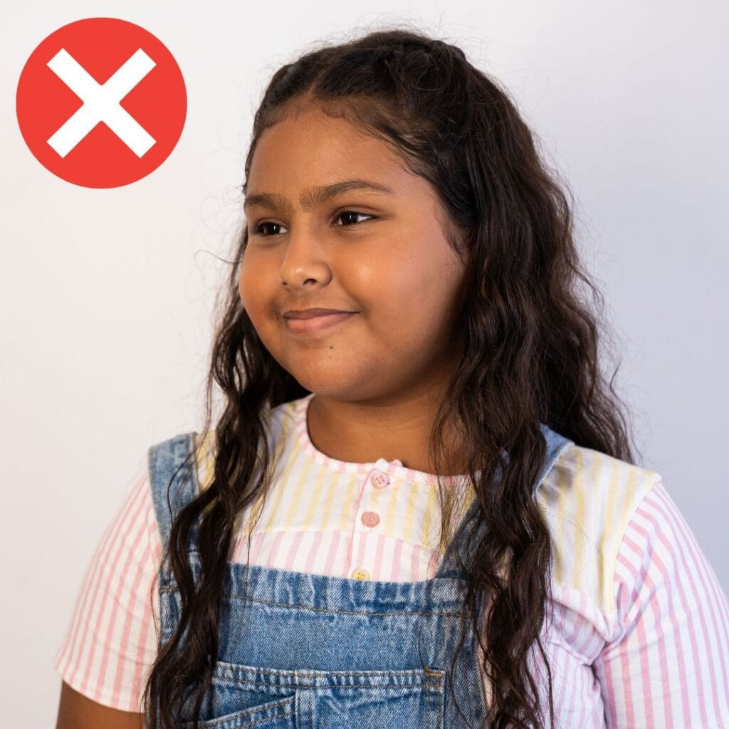 incorrect passport photo of a child not facing the camera directly