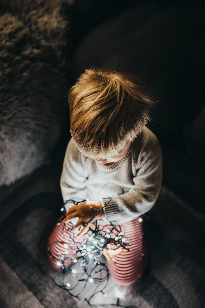 Two vertical images showcasing different perspectives and compositions for DIY Christmas photos, encouraging creative experimentation.