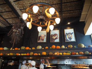 Wall of awards and wine bottles at Don Julio restaurant in Buenos Aires
