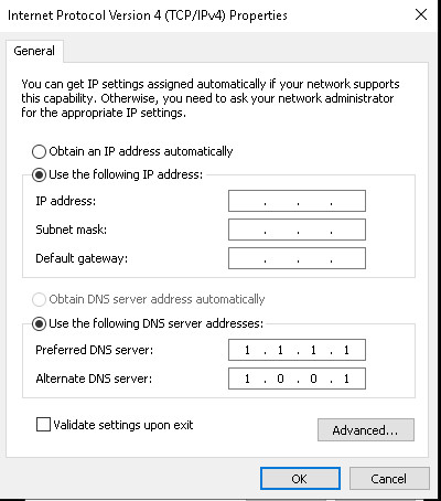 Manually configuring static IP address, subnet mask, and default gateway in network adapter settings.