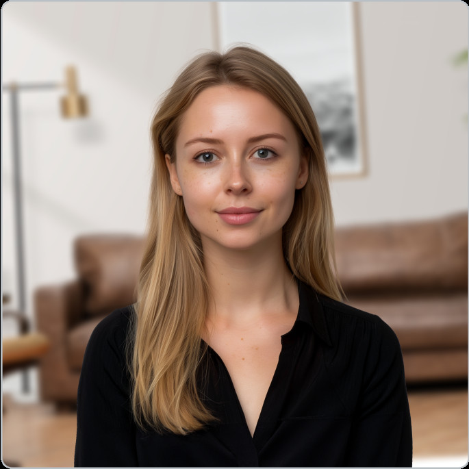 Person using PhotoAiD passport photo maker on a phone, showcasing the ease of use and digital solution