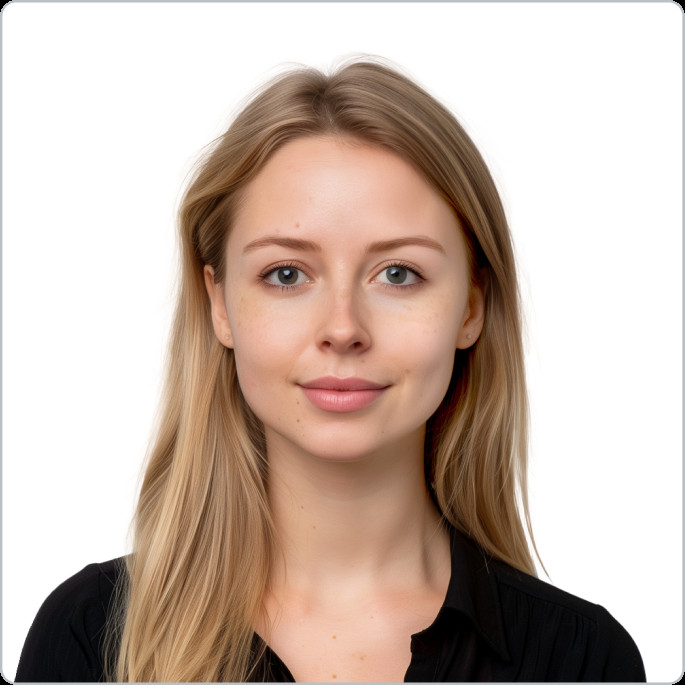 A person taking a passport photo against a white background