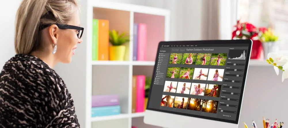 How to resize an image: a woman looking at a photo collection on the computer