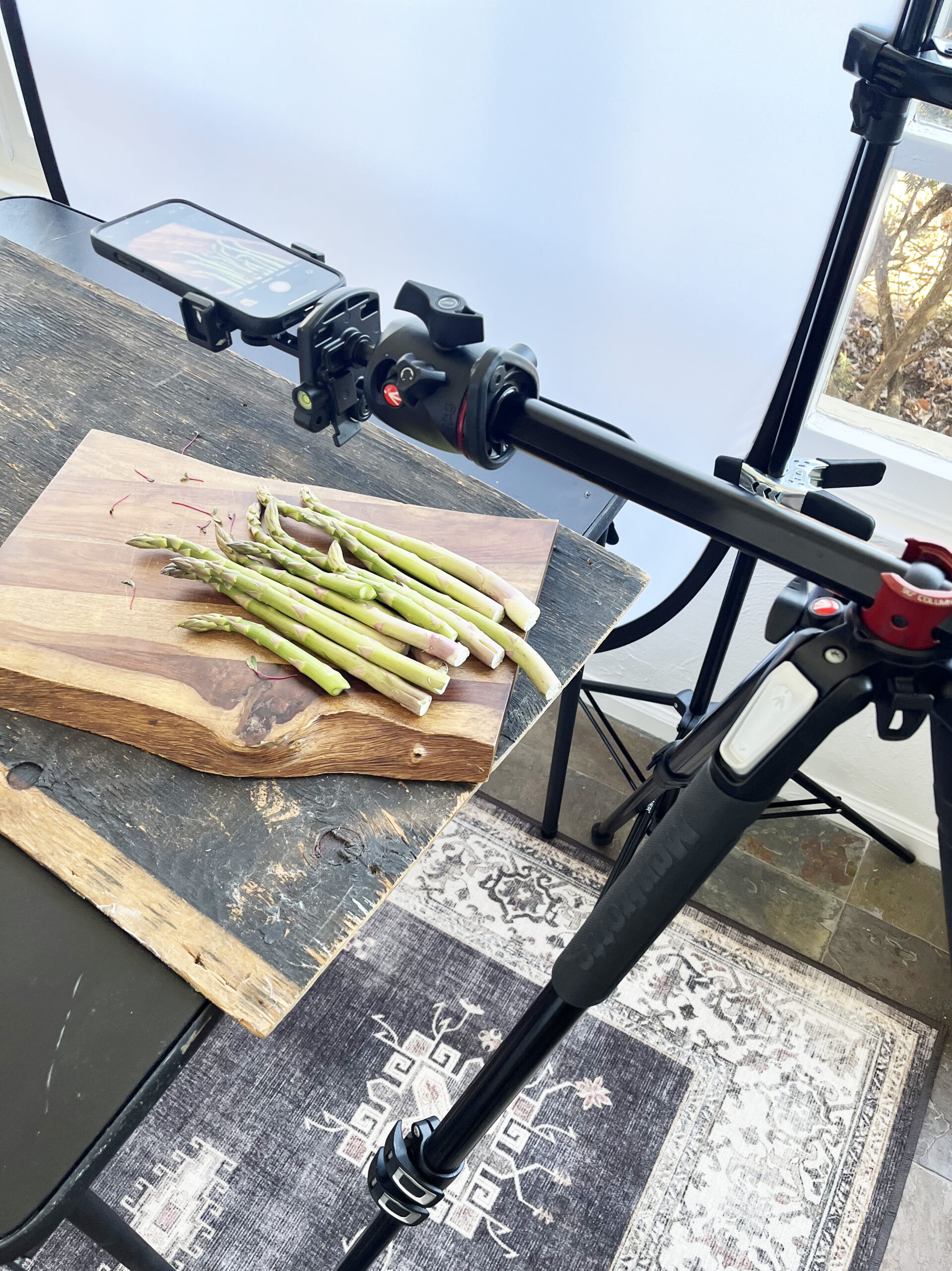 iPhone mounted on a tripod for stability