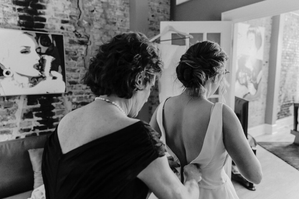Wilmington NC wedding ceremony with brick walls and natural light at Bakery 105