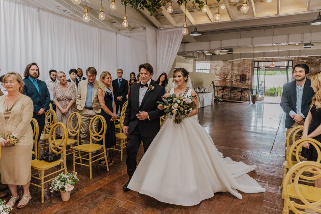 Elegant wedding reception decor inside Bakery 105 in Wilmington NC