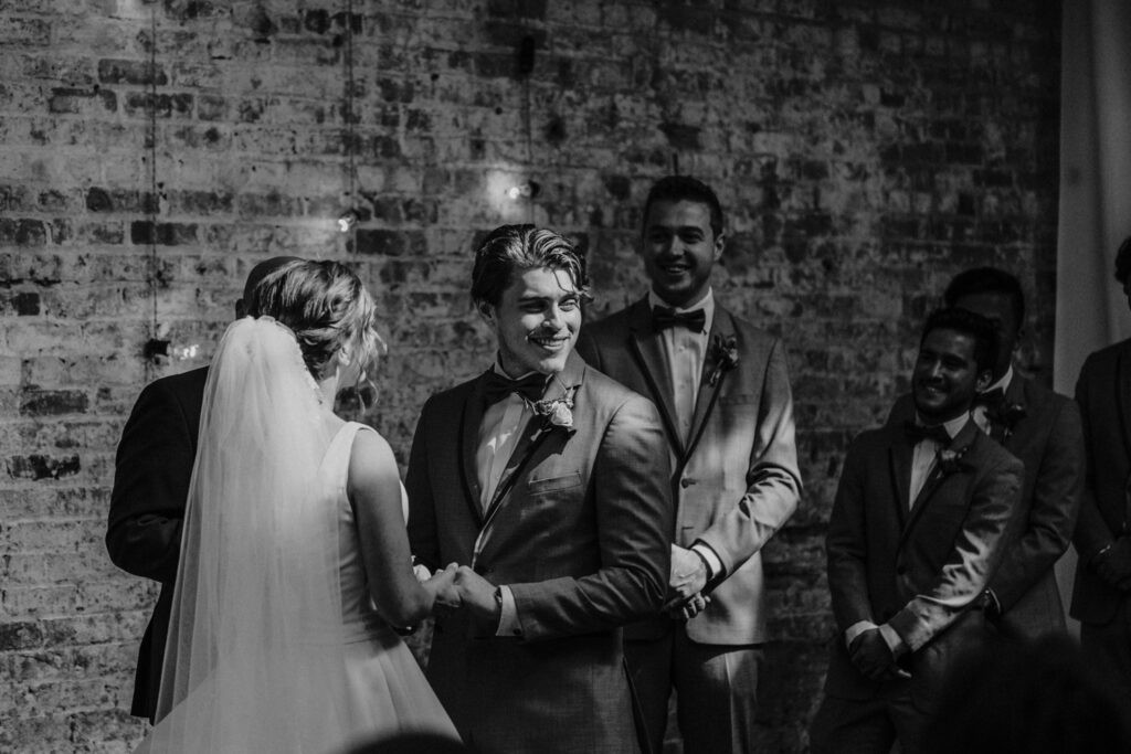 Joyful moment during the first dance at Wilmington NC wedding reception