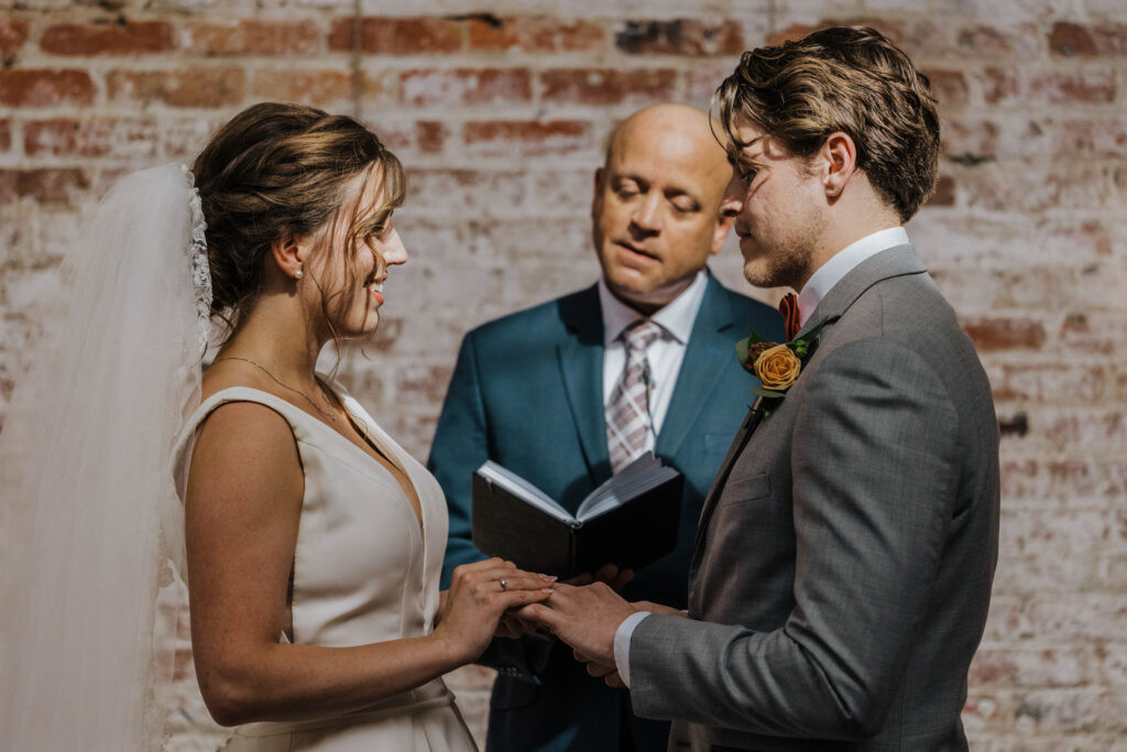 Candid photo of wedding guests enjoying the dance floor at Wilmington NC wedding