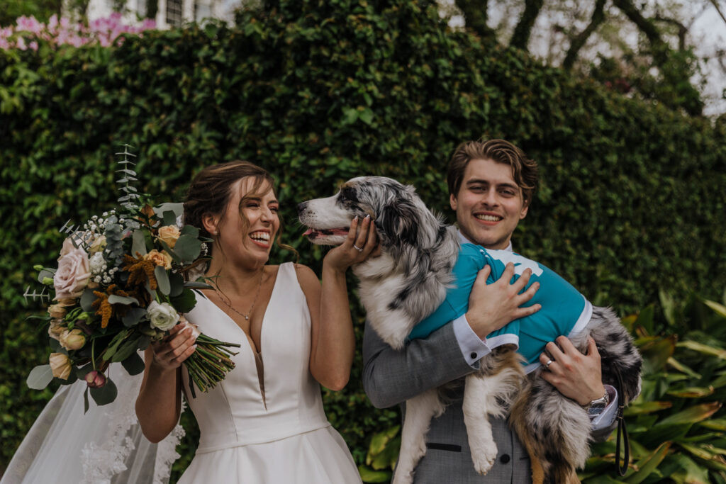 Bride and groom holding hands walking in natural light Wilmington NC wedding