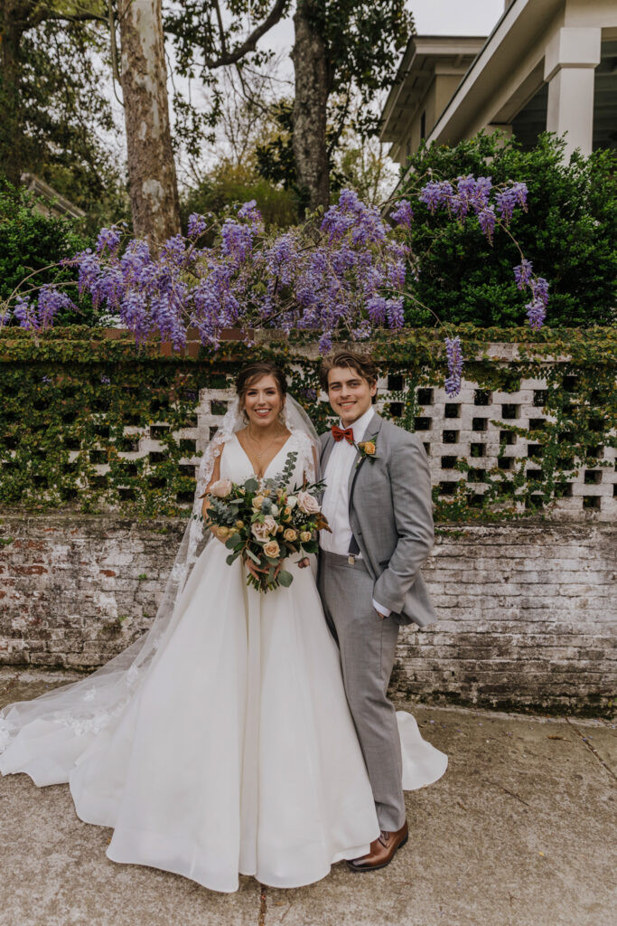 Bride and groom portrait with greenery in Wilmington NC wedding photo