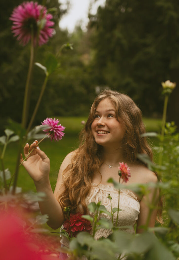 girl smelling flowers 