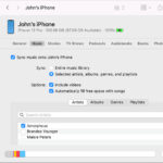 An image depicting syncing photos from a computer to an iPhone using Finder on macOS.