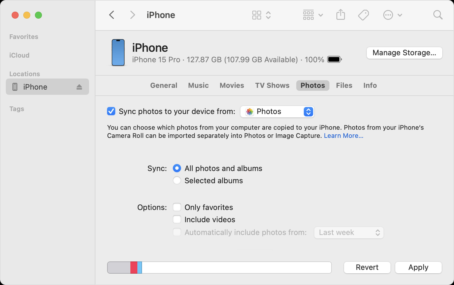 An iPhone screen displaying the option to sync photos to the device from the Photos application on a computer