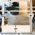 Diagram illustrating the measurements for cutting plywood into an oversized polaroid frame, clearly showing the 3-inch top and side frames and the 10-inch bottom frame.