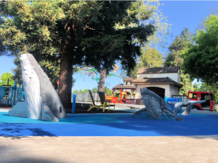 Children can climb on whale structures at Hayward playground