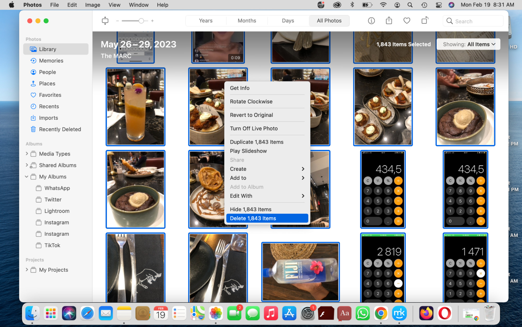 Select all photos with Cmd + A and press Backspace to delete all photos from the Photos Library on a Mac.