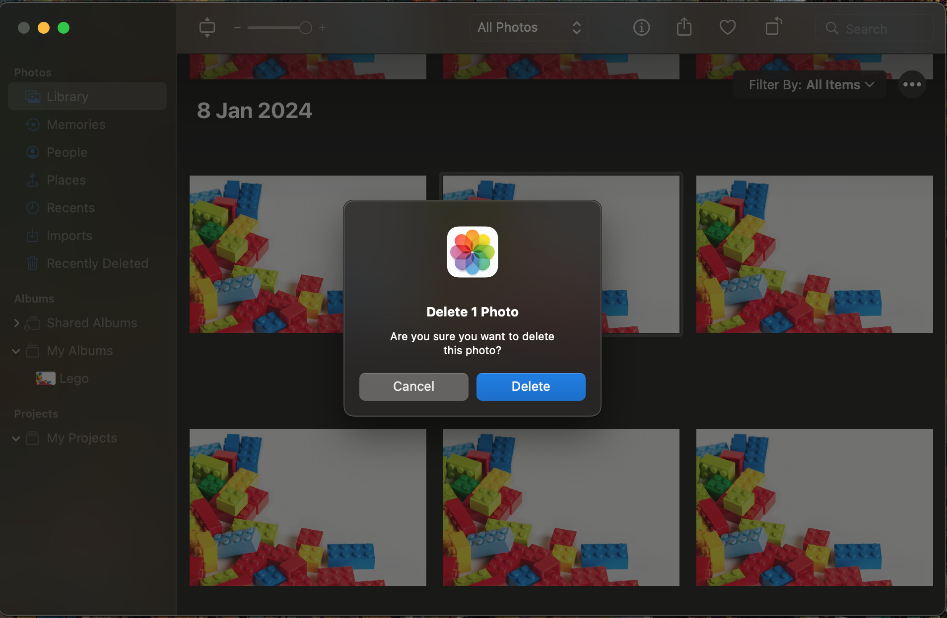 Open the Photos app, select images, and press Backspace to delete photos using shortcuts on a Mac.