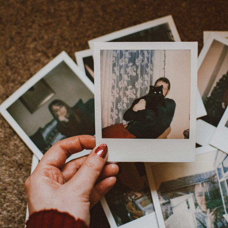 A stack of polaroid photos