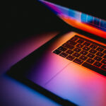alt text: A laptop displaying the Instagram web interface with the option to upload multiple photos.