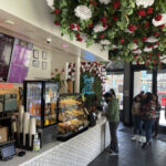 Front counter at Con Azucar Café with pan dulce display