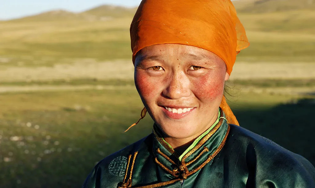 Portrait of a Mongolian woman, representing cultural diversity in travel stock photography