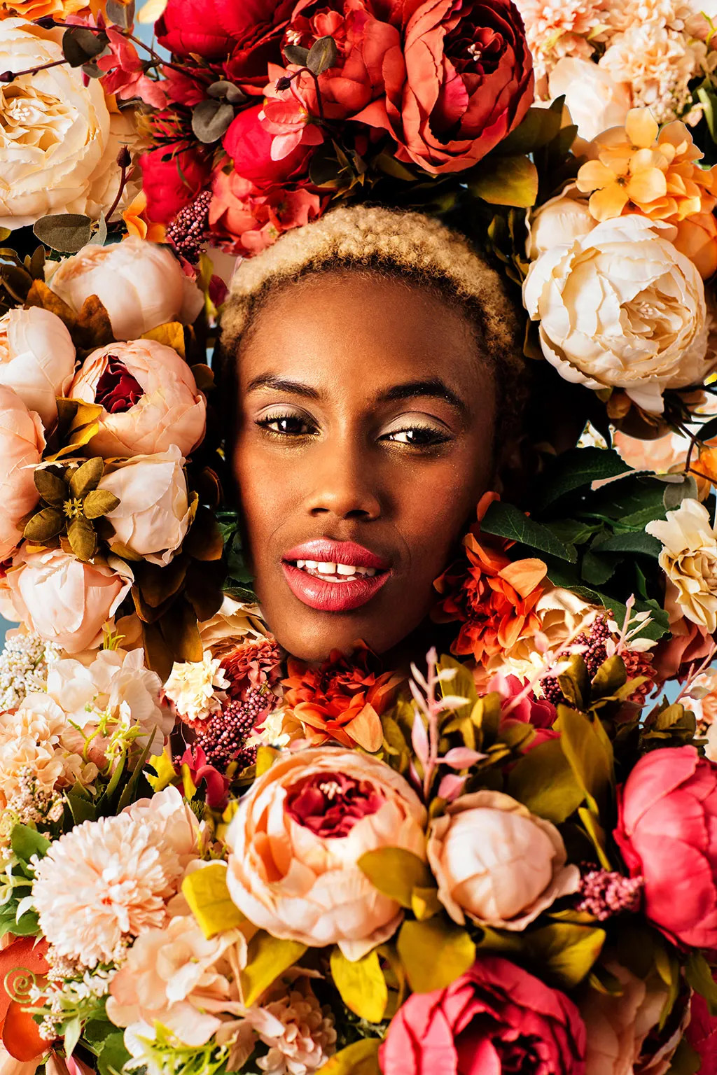 Portrait of a woman with flowers, showcasing diversity and natural beauty in stock photography