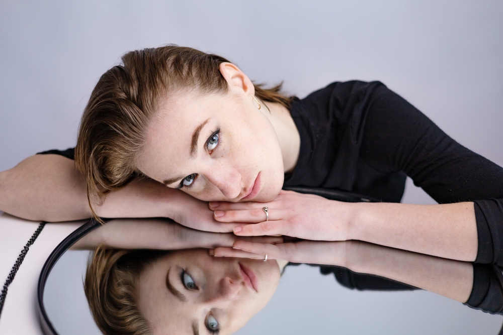 girl reflection in the mirror table