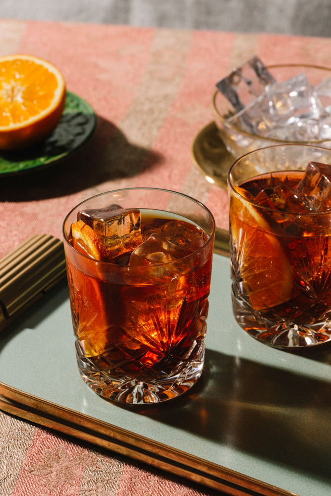 Close up of a Negroni cocktail with orange peel garnish