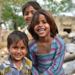 Smiling children in India joyfully playing and laughing