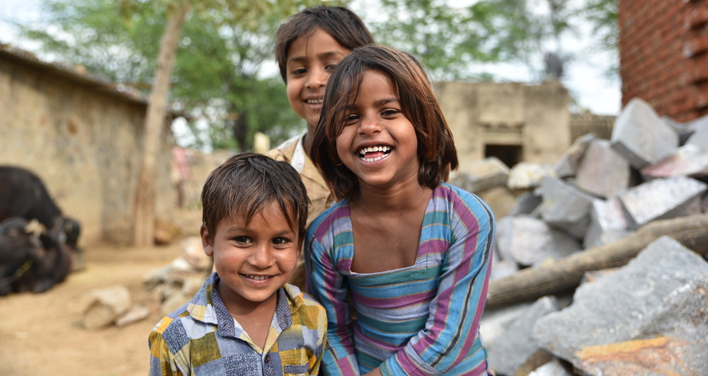 Smiling children in India joyfully playing and laughing