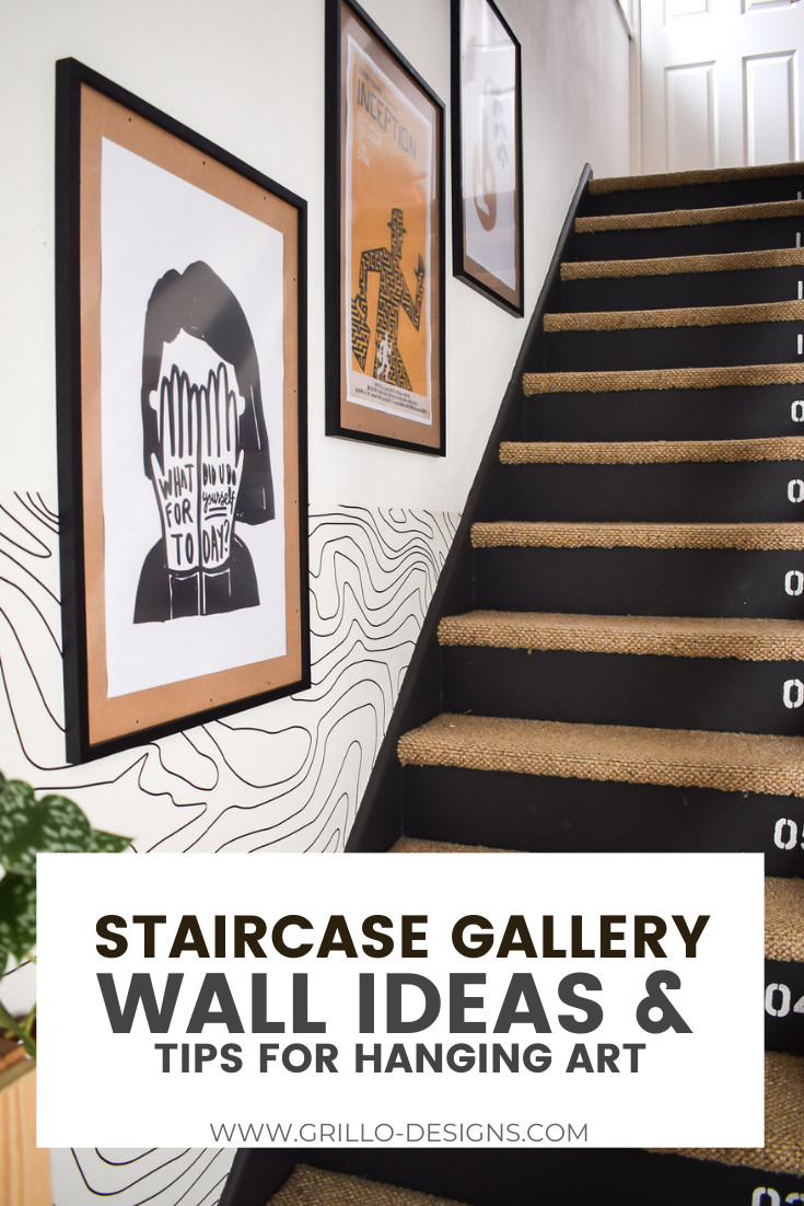 Elegant staircase gallery wall featuring a variety of picture frames and art, demonstrating how to arrange photos on a staircase wall