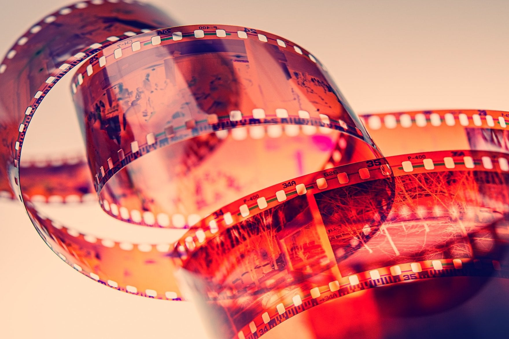 A close-up of a strip of film negatives, showcasing the inverted images and tonal range captured during the photographic process