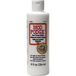Applying Mod Podge Photo Transfer Medium with a foam brush for a smooth transfer