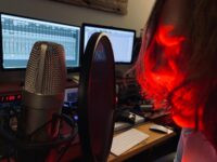 Bloody Mary, aka Ginger Williamson, finishing the radio piece. (Photo by Aubrey Ralph)