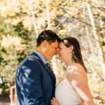 Engagement photos in Santa Fe, New Mexico with adobe architecture and vibrant colors