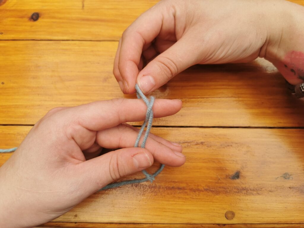 Removing the back loop from the finger sets the stage for adjusting the slip knot's tension