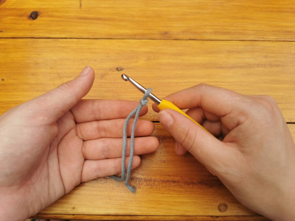 Securing the slip knot on the hook allows for easy adjustment and smooth start to any crochet project