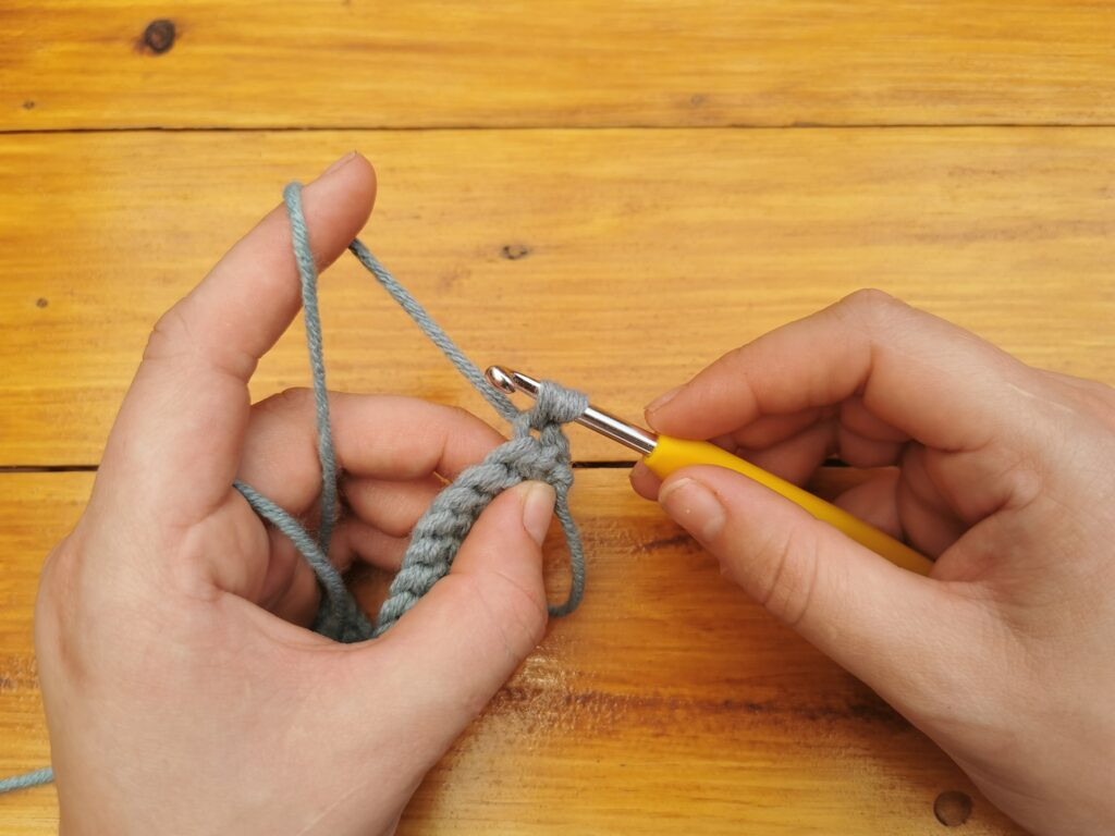 Having two loops on the hook sets the stage for the final step of the single crochet