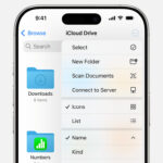 Files app interface on iPhone, showing iCloud Drive selected and options like Select, New Folder, and Scan Documents