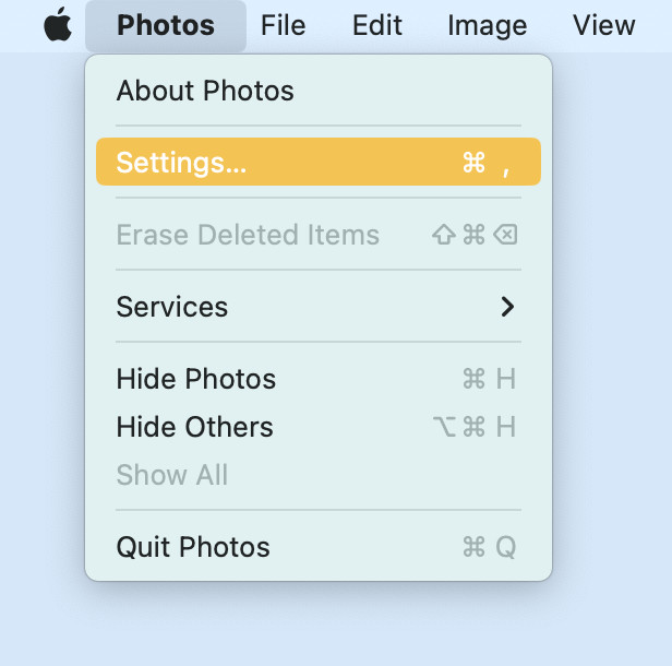 Screenshot of the Photos menu showing Settings selected