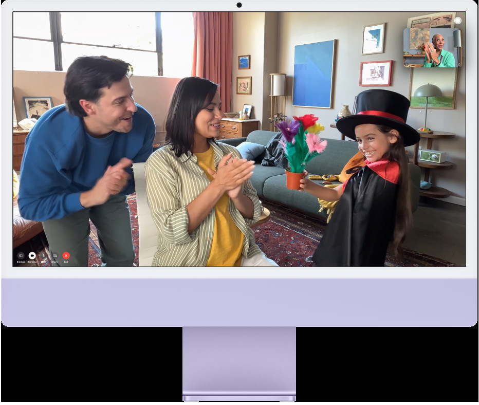 An iMac displaying people using Center Stage, highlighting its functionality for video calls and photography, enhancing user engagement and visual experience.